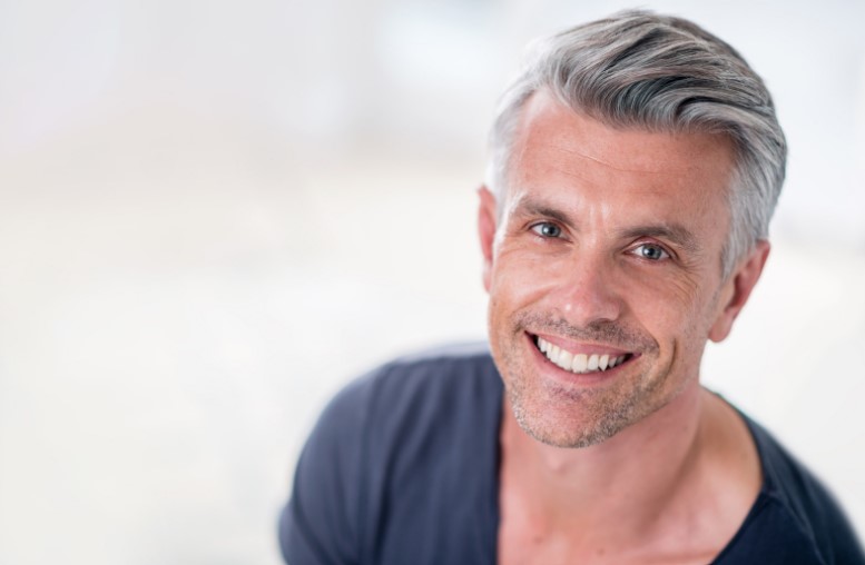 Patient receiving professional teeth whitening in Guildford.