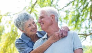 A patient smiling confidently after receiving Dental Implants in Dulwich at Green Lane Dental Centre.